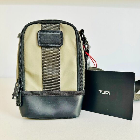 TUMI ROGERS OLIVE AND BLACK EXPANDABLE SMALL CROSSBODY BAG UNISEX $275 - Picture 1 of 9